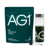 AG1 envase frontal con shaker mostrando conveniencia diaria