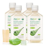 AloeCure botella frontal 500 ml mostrando el color natural del jugo