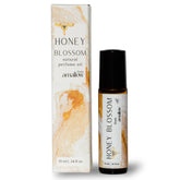 Amallow frasco frontal Honey Blossom mostrando diseño y portabilidad