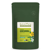 Banyan Botanicals envase frontal de Gokshura mostrando formato y sello orgánico