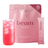 BEAM envase frontal del suplemento Glow mostrando diseño y porciones
