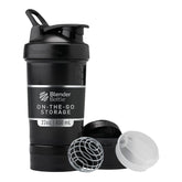 BlenderBottle ProStak frente mostrando bote negro y frascos, solución portátil
