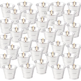 CAKETYCG vista frontal del paquete de 32 velas, ideal para ambientar patios