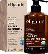 Cliganic aceite de almendras frontal botella mostrando etiqueta orgánica y beneficio hidratante