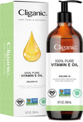 Cliganic botella frontal mostrando aceite vitamina E, pureza visible