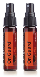 doTERRA bruma On Guard frontal mostrando el pack y uso portátil
