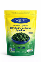 Earthrise empaque frontal mostrando tabletas y beneficios principales