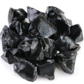Fireboomoon envase frontal mostrando obsidiana negra cruda y variedad