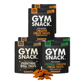 GYM SNACK paquete frontal variedad mostrando los tres sabores y beneficio de proteína alta