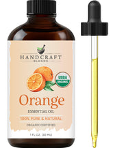 Handcraft Blends botella frontal de naranja, muestra pureza y presentación
