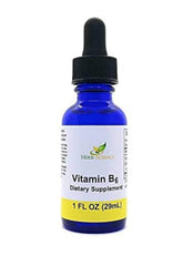 Herb-Science frasco frente en vidrio azul mostrando etiqueta legible y protección UV