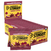 Honey Stinger frente del paquete Pomegranate Passionfruit mostrando marca y beneficios