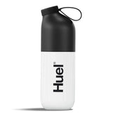 Huel botella mezcladora frontal mostrando diseño opaco y cierre seguro