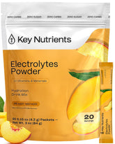 KEY NUTRIENTS caja frontal durazno-mango mostrando presentación portátil y sabor
