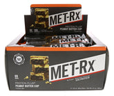 MET-Rx empaque frontal mostrando la barra y beneficio de proteína alta