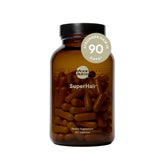 Moon Juice SuperHair envase frontal mostrando 120 cápsulas para apoyo capilar