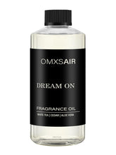 omxsair frasco frente mostrando diseño y capacidad 500 ml, transmite calidad