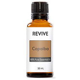 REVIVEEO copaiba botella frontal mostrando etiqueta y uso seguro
