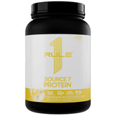 Rule 1 Proteins frontal del envase mostrando sabor Banana Cream y beneficio conveniencia
