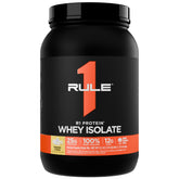 Rule 1 Proteins envase frontal Banana Creme mostrando el diseño y beneficio de proteína pura