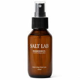 SALT LAB envase frontal mostrando diseño y tamaño compacto para viaje