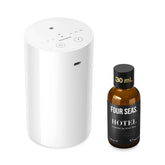 ScentBots vista frontal del difusor negro mostrando controles y diseño elegante