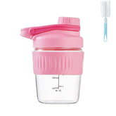 ShakeXpert vista frontal del shaker rosa con tapa segura y diseño compacto