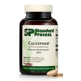 Standard Process Calcifood frontal del envase mostrando presentación y beneficios