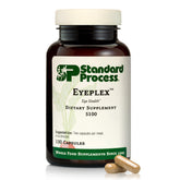 Standard Process Iplex frente del empaque mostrando cápsulas y beneficios de apoyo ocular
