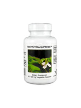 Supreme Nutrition primer plano del frasco con cápsulas vegetales claras