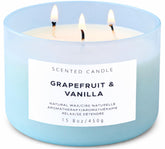 T&H vela Grapefruit Vanilla frontal en vaso azul, aporta elegancia y aroma