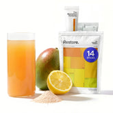 The Absorption Company empaque frontal mostrando sabor Mango Lemonade y beneficios
