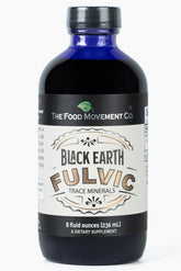 THE FOOD MOVEMENT CO. botella frontal del suplemento Black Earth, diseño claro y profesional