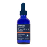 Trace Minerals frasco frontal mostrando la marca y beneficio de reposición mineral