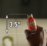 5-hour ENERGY shot sobre escritorio para energía durante jornadas de trabajo
