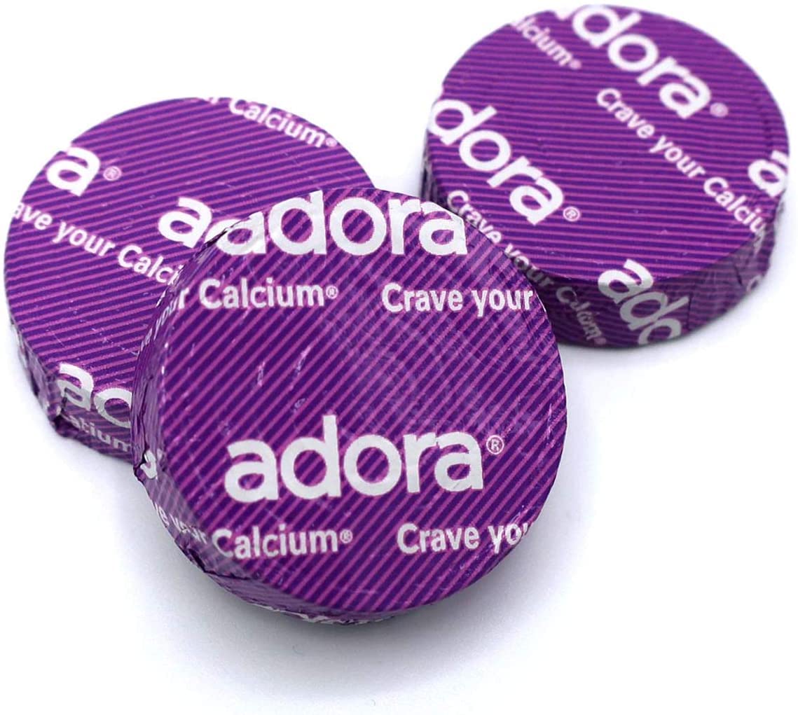 Adora presentación de dos discos junto a una bolsa, facilita llevar suplementos sabrosos en la rutina