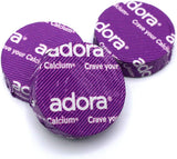 Adora presentación de dos discos junto a una bolsa, facilita llevar suplementos sabrosos en la rutina
