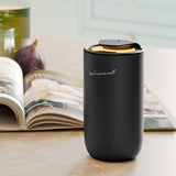 Air-Scent difusor en uso sobre escritorio aportando aroma y ambiente cómodo