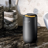 Air-Scent tapa giratoria abierta mostrando recarga fácil y sin derrames