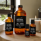 Air-Scent comparado en mano para mostrar tamaño real de 120 mL y portabilidad