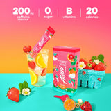 Alani Nu mezcla en vaso con color fresa y bebida refrescante al instante