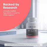 Allergy Research Group frasco junto a una regla para comparar tamaño