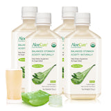 AloeCure botella frontal 500 ml mostrando el color natural del jugo
