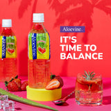 Aloevine escena estilo de vida con botella fría en mesa para hidratación rápida