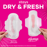 Escena lifestyle con Always Radiant en bolso y ropa ajustada para uso cotidiano