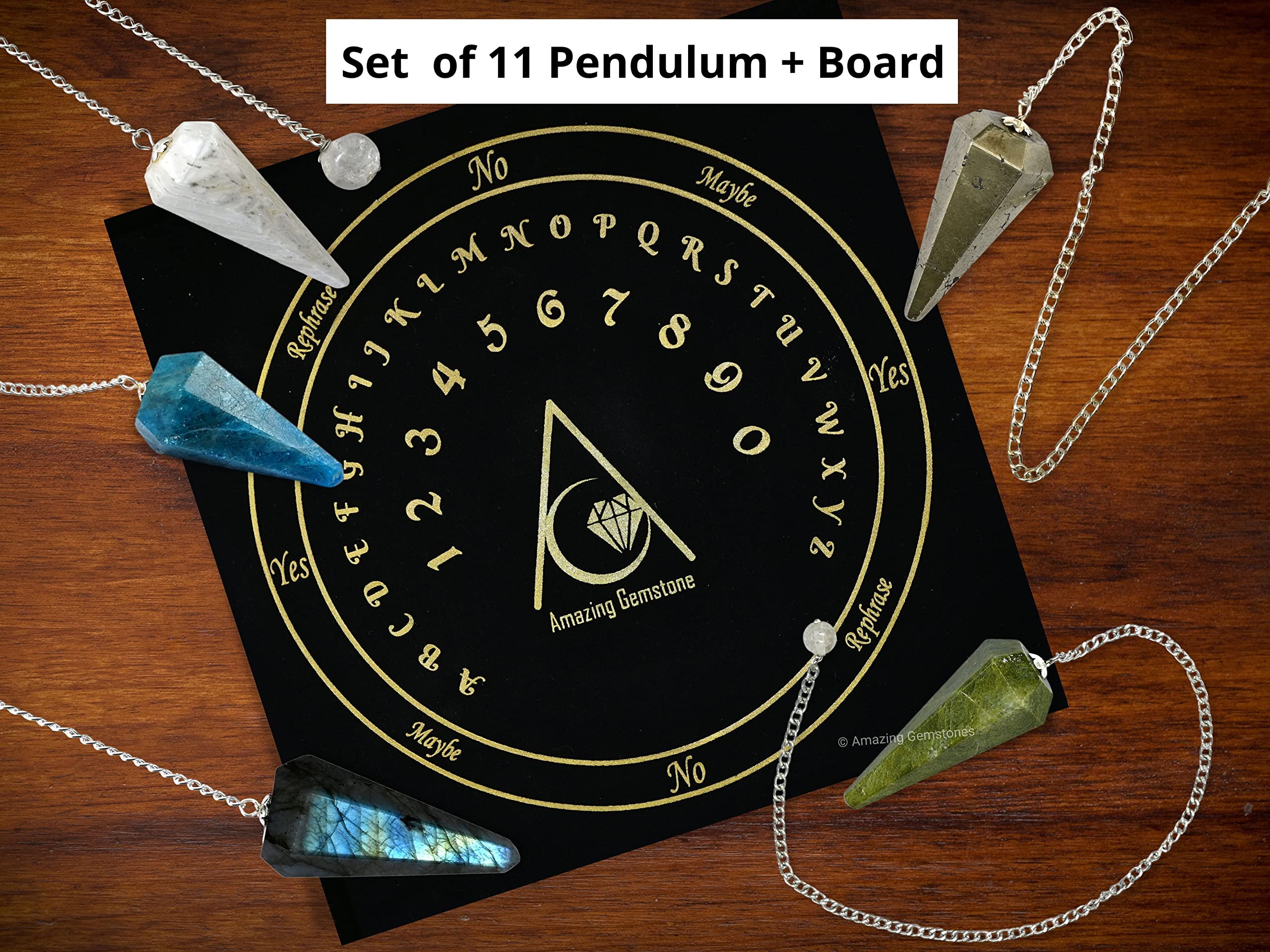 Amazing Gemstone péndulos dispuestos sobre tablero de terciopelo, uso claro