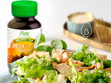 Amazon Andes cápsula en mano junto a alimentos, para toma diaria y mejor absorción