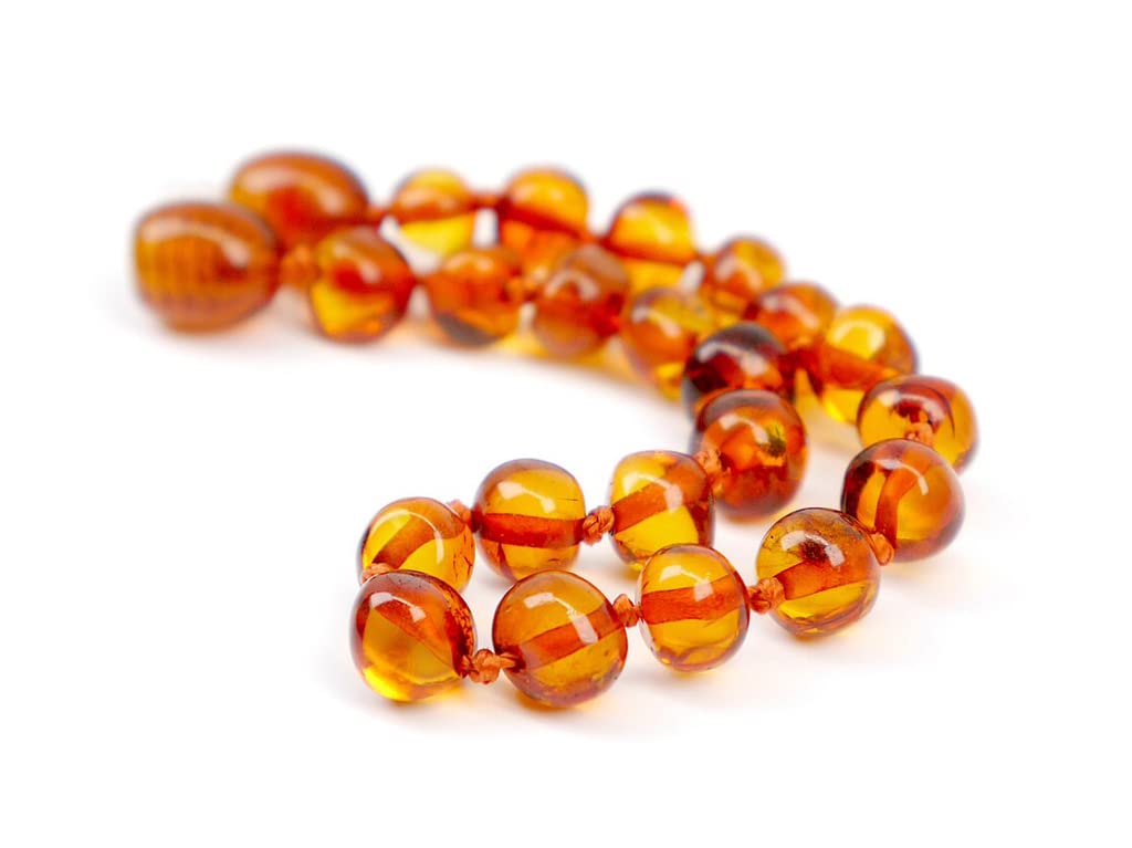 Amber Touch pulsera puesta en muñeca para mostrar ajuste ceñido y apariencia