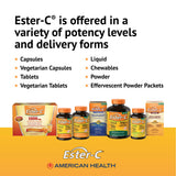 American Health Ester-C cápsulas junto a frutas cítricas, sugiere bioflavonoides