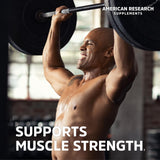 American Research Supplements cápsulas junto a una moneda para comparar tamaño y facilidad de ingestión